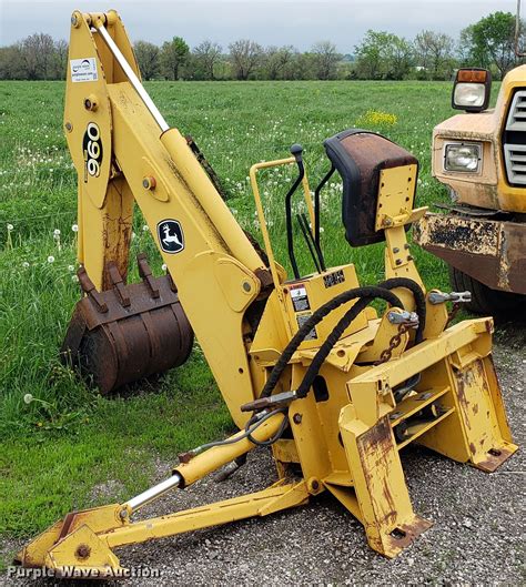 backhoe attachment for john deere skid steer|john deere 8b backhoe attachment.